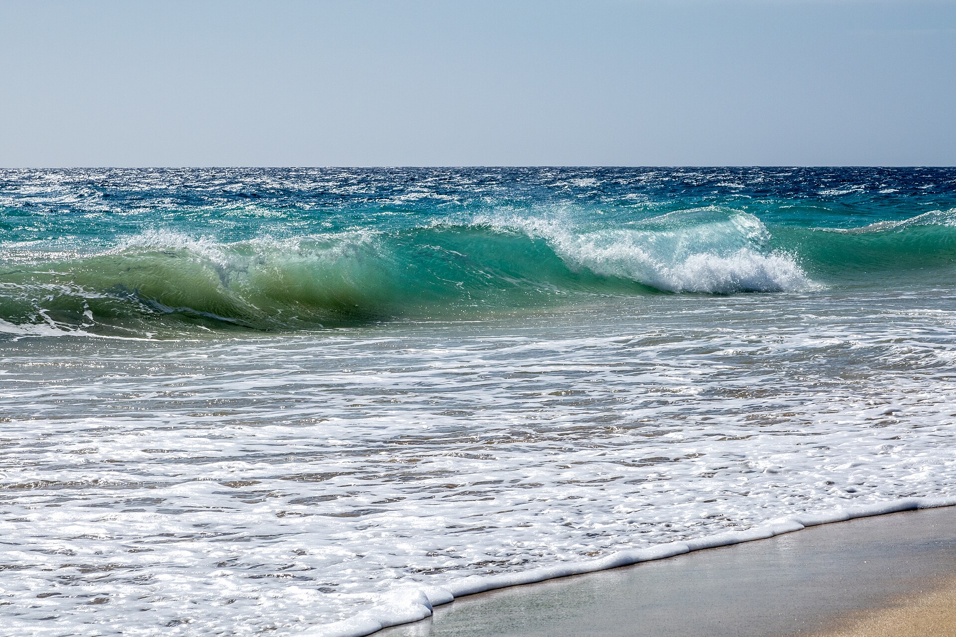 Breaking waves on the beach of Morro Jable , Fuerteventura , Spain